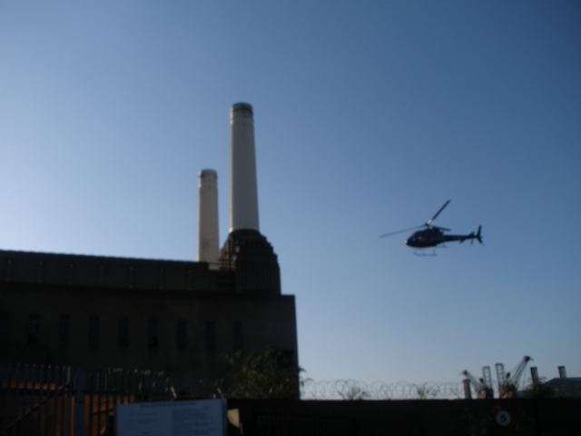 Private helicopter taking off from Battersea Power Station